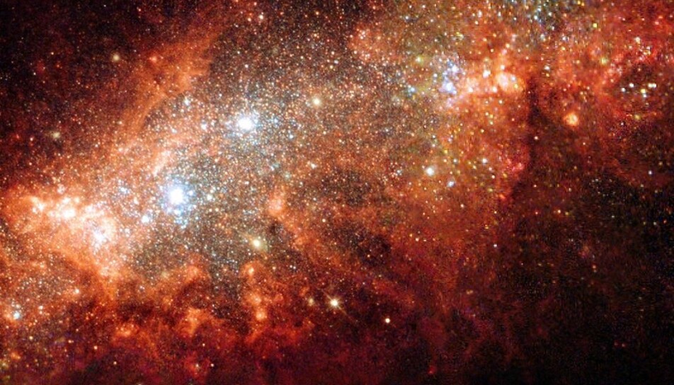 I alle stjerner moses grunnstoffer sammen. Dette danner nye grunnstoffer, og frigjør energi. Bildet viser dverggalaksen NGC 1569.
