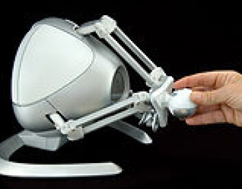 "Novint Falcon haptic interface. Foto: Novint Technologies" "Novint Falcon haptic interface. Foto: Novint Technologies"