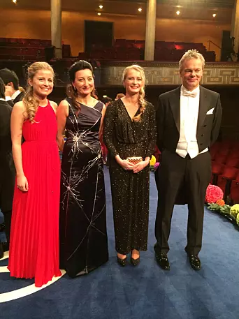 May-Britt and Edvard I. Moser and their two daughters on stage after the Nobel Prize Award Ceremony at the Stockholm Concert Hall, 10 December 2014.