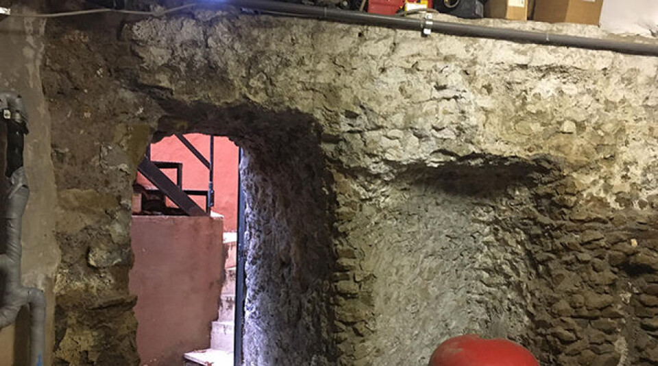 A glimpse of the modern staircase through the ancient aqueduct ruins in the basement of the Norwegian institute in Rome. A glimpse of the modern staircase through the ancient aqueduct ruins in the basement of the Norwegian institute in Rome.