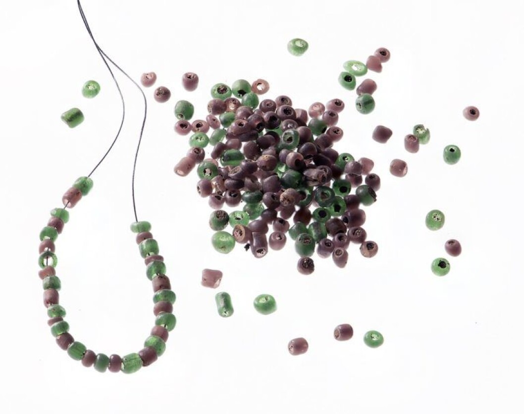 At least 339 pearls were placed with the woman in the burial chamber. At least 339 pearls were placed with the woman in the burial chamber.