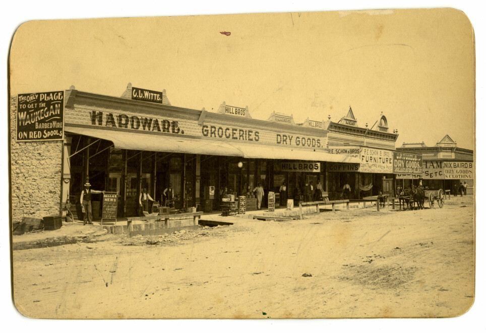 The main street in Clifton, Texas, 1898. After the railroad came through the Bosque Valley in 1881, Norwegian immigrants and all others got an excellent connection with Galveston in the south and Fort Wort/Dallas in the North. Clifton became the most important town in the county. Several of the businesses along the street were operated by Norwegian and German immigrants.