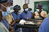 CapaCare students teach each other during surgical training. CapaCare students teach each other during surgical training.