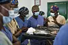 CapaCare students teach each other during surgical training.