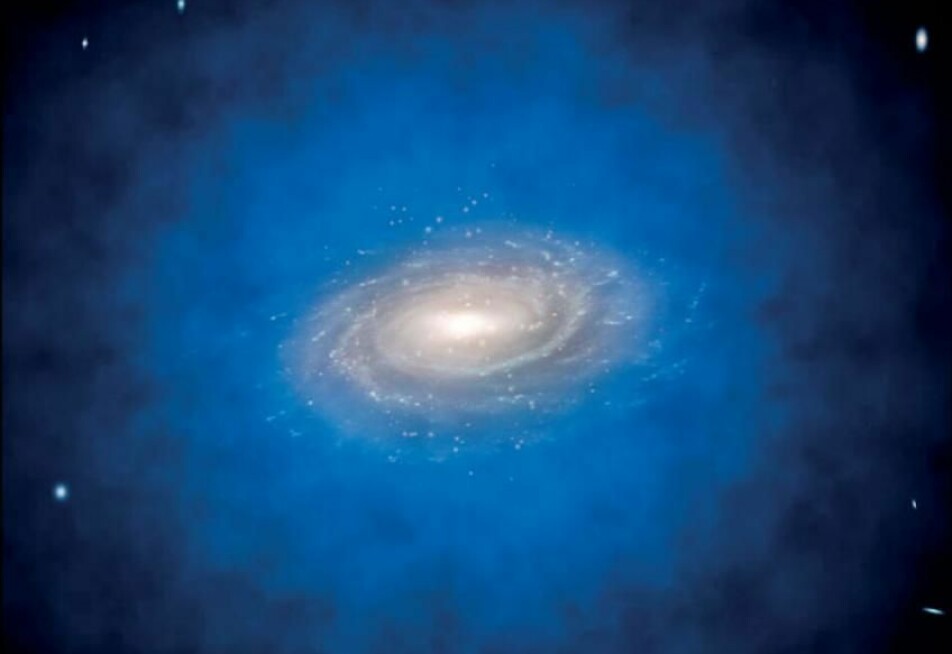 En kunstners tolkning av en galakse innhyllet i en halo av mørk materie, vist i blått.