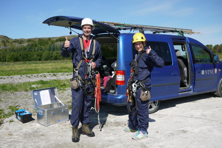 Henrik Jensen, left, and Stefanie Muff, suited up in protective coveralls and climbing gear as they head out to check house sparrow nests on an island off of Helgeland, at the Arctic Circle. They need the climbing gear because the birds nest up high in the eaves of barns. Jensen is a professor in NTNU’s Department of Biology and Muff is an associate professor in the university’s Department of Mathematical Sciences.