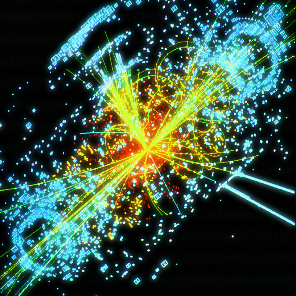 Denne datasimuleringen viser hvordan Higgs-bosonet eventuelt kan komme fram i en av detektorene til LHC. Higgs-bosonet brytes ned i to stråler av andre elementærpartikler (gule linjer). (Figur: CERN)