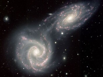"Teoretisk sett skulle massen til galaksene senket farten på universets utvidelse. Så hvorfor går det fortere? (Foto: Gemini Observatory)" "Teoretisk sett skulle massen til galaksene senket farten på universets utvidelse. Så hvorfor går det fortere? (Foto: Gemini Observatory)"