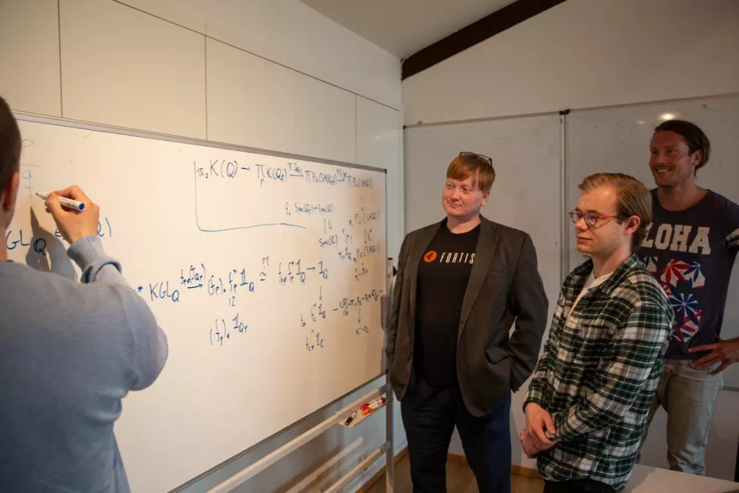 Paul Arne Østvær, professor of mathematics at the University of Oslo (UiO) together with three of his project participants at CAS.
