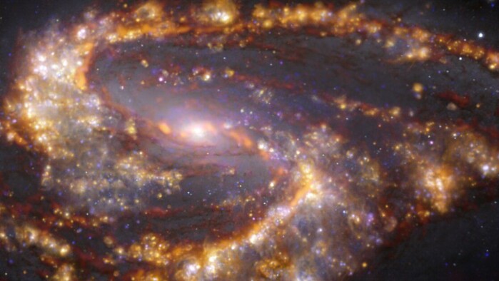 Galaksen NGC 3627, 31 millioner lysår fra jorden. Her er bildene fra ALMA og VLT kombinert. Galaksen NGC 3627, 31 millioner lysår fra jorden. Her er bildene fra ALMA og VLT kombinert.
