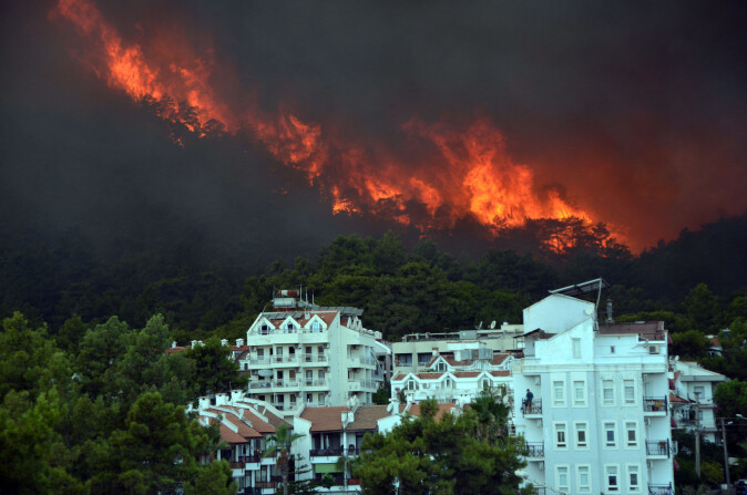 A recent wildfire in the forest near the resort town of Marmaris, Turkey. A recent wildfire in the forest near the resort town of Marmaris, Turkey.