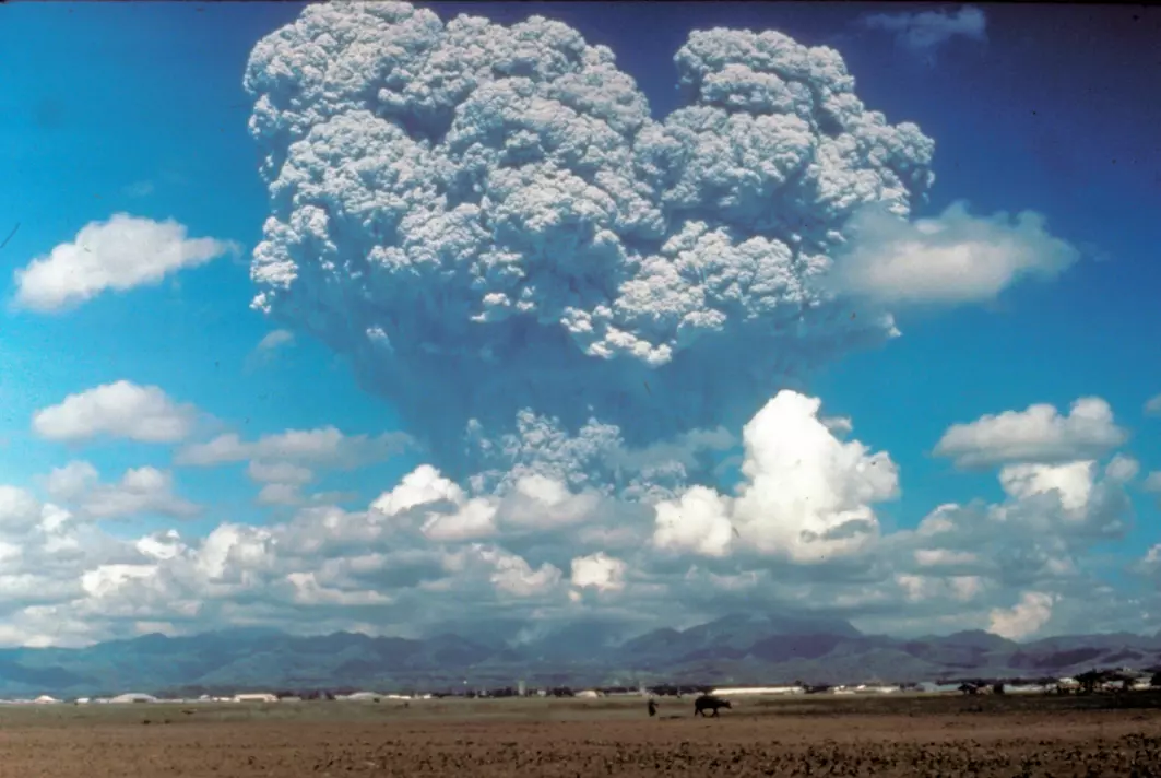 When Mt Pinatubo erupted in 1991, it ejected 20 million tonnes of sulphur dioxide into the atmosphere. Over the months following the eruption, the aerosols formed a global layer of sulphuric acid haze. Global temperatures dropped by about 0.4 °C from 1991–1993. That's a natural form of solar geoengineering that humans could try to mimic to cool the planet.