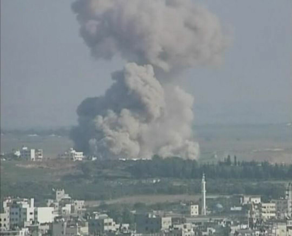 Røyk fra et boligområde i Gaza etter et Israelsk angrep i januar 2009, under Gaza-krigen. (Foto: Al Jazeera/Wikimedia Commons)