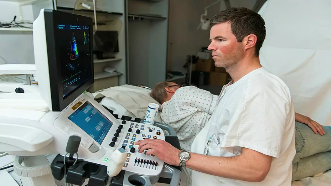 Klaus Murbræch performs an ultrasound examination of a heart patient at Oslo University Hospital.