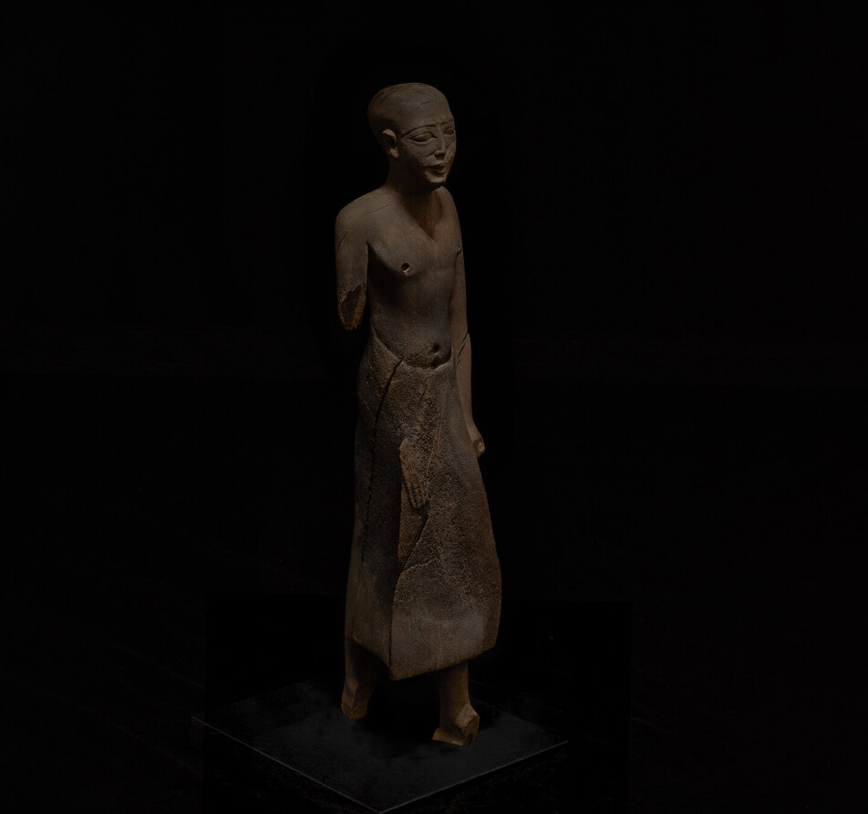 Mannen figuren avbilder jobbet trolig i et egyptisk tempel, og hans undersåtter måtte vise ham respekt og ærefrykt.