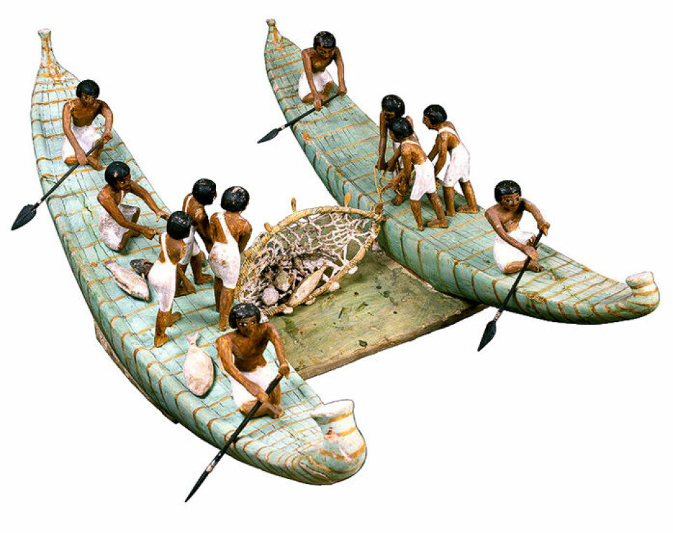 Er dette verdens første trål? Modell fra om lag 2000 f. Kr. funnet i gravkammer fra Egypts Mellomrike. Tilapia og multefisk var blant artene som ble fanget i Nilen. (Foto: Egyptian Museum Cairo og Global Egyptian Museum)