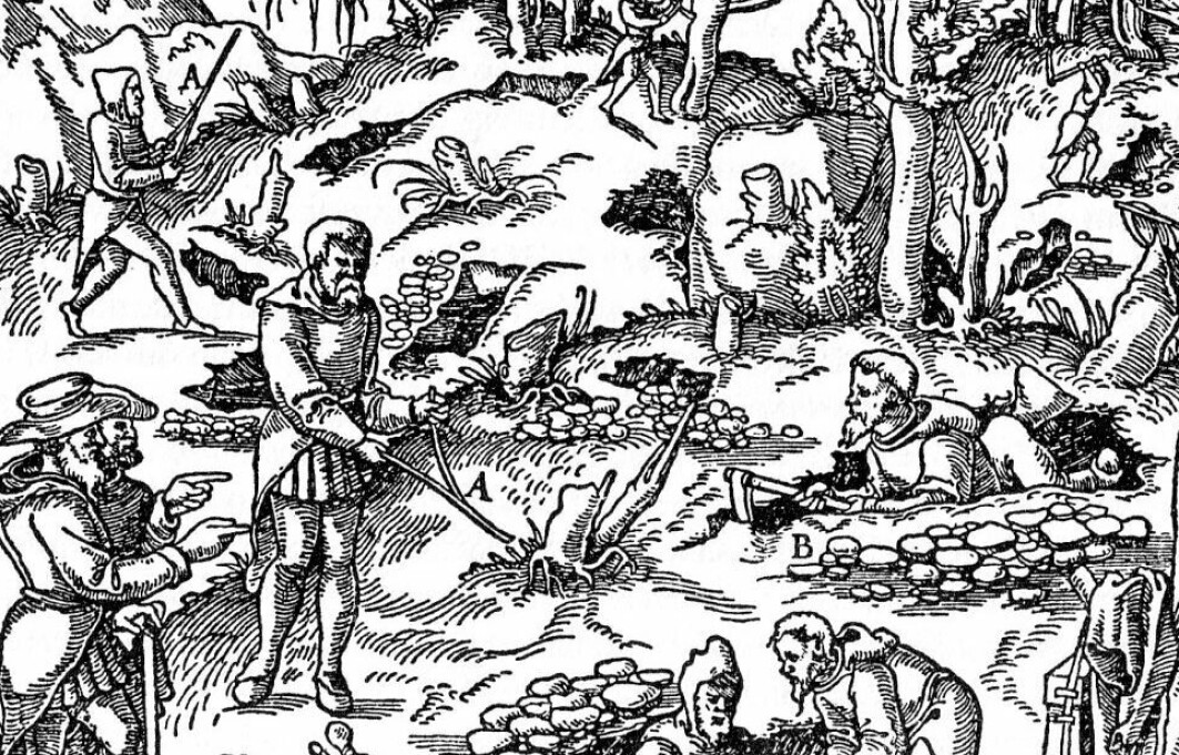 Tresnitt fra boken <span class=" italic" data-lab-italic_desktop="italic">De re metallica</span> fra 1556 viser folk som bruker ønskekvist i forbindelse med gruvedrift. Tresnitt fra boken <span class=" italic" data-lab-italic_desktop="italic">De re metallica</span> fra 1556 viser folk som bruker ønskekvist i forbindelse med gruvedrift.