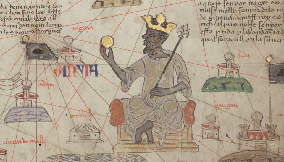 Mansa Musa var hersker over Mali-riket i perioden 1312–1337. Fremstilling av Mansa Musa sittende på en trone med en gullklump i hånden.