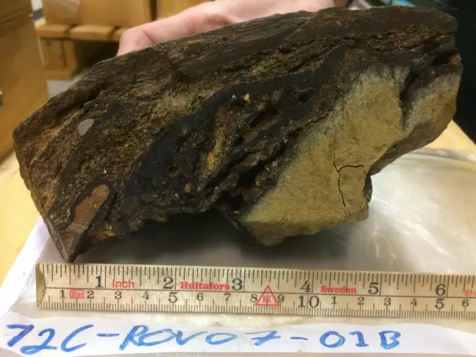 This nodule was sampled from the seabed on the Norwegian shelf. The darker areas contain manganese.