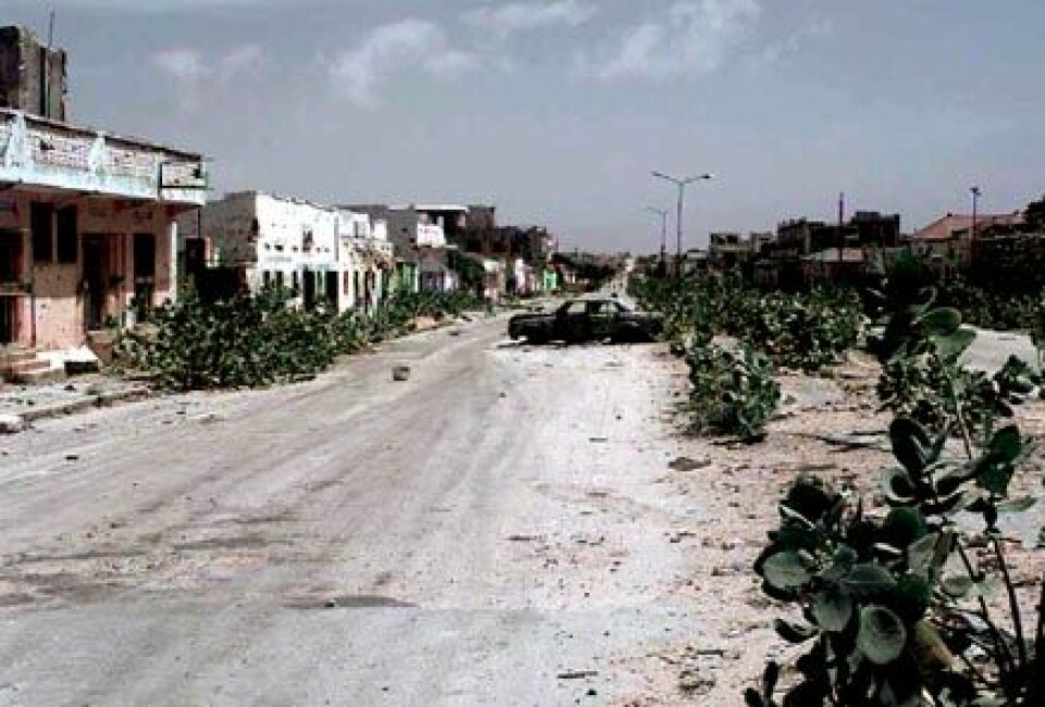 'En gate i Mogadishu, som tidligere skilte to ulike klaner. (Foto: Wikimedia commons)'