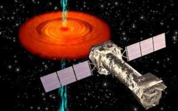 Illustrasjon av XMM-Newton med et sort hull i bakgrunnen. (Illustrasjon: ESA) Illustrasjon av XMM-Newton med et sort hull i bakgrunnen. (Illustrasjon: ESA)