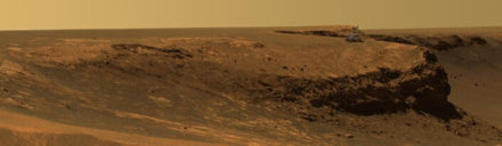 "Illustrasjon av roveren Opportunity ved et krater på Mars. (Illustrasjon: NASA)" "Illustrasjon av roveren Opportunity ved et krater på Mars. (Illustrasjon: NASA)"