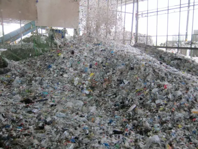 Used paper contains large amounts of non-recyclable plastic waste. This photo is taken from Vietnam’s largest paper factory in Can Tho, which also recycles paper.