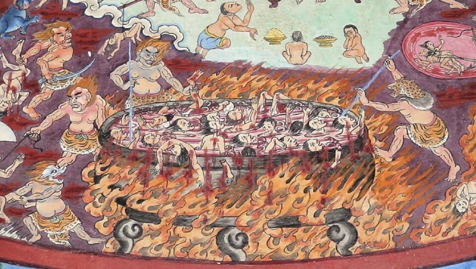 I denne buddhistiske versjonen er helvete ein varm stad der menneske blir kokt og spidda av demonar. Biletet er frå eit kloster i Tibet.