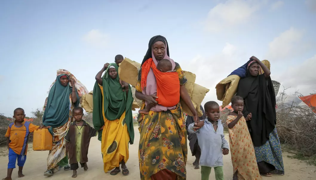 Somaliere som flyktet fra tørkerammede områder, måtte tidligere i sommer søke tilflukt i en provisorisk leir for de fordrevne i utkanten av Mogadishu. Mange millioner mennesker blir rykket opp av naturkatastrofer som følge av klimaendringer, men foreløpig er det etablert få mekanismer for å hjelpe dem.