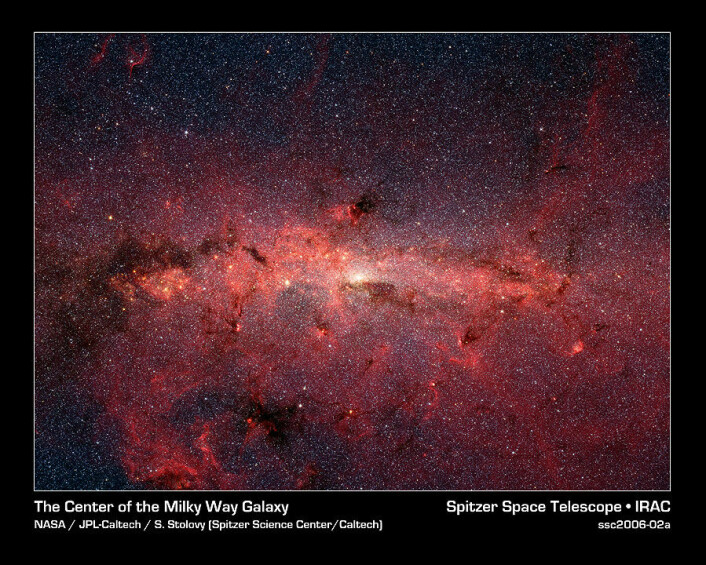 "Melkeveiens sentrum sett i infrarødt med Spitzer-teleskopet, fotografert i 2004 og 2005. Bildet er en mosaikk av flere tusen korte eksponeringer. (Foto: NASA/JPL-Caltech/S. Stolovy)."