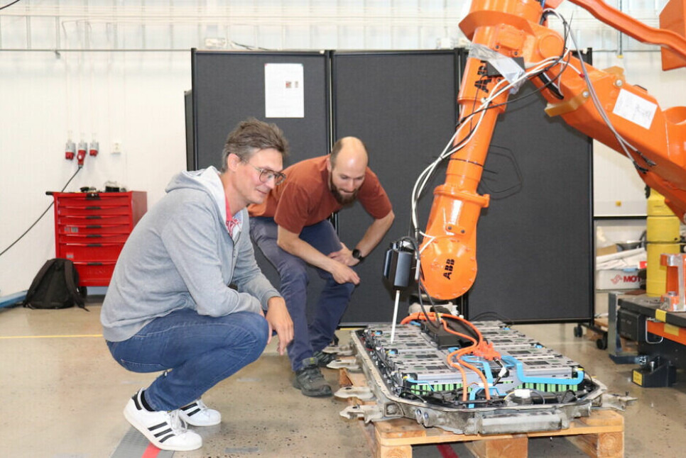 Ilya Tyapin (left) and Martin Choux check that the fine-tuned robot gripper works as it should.