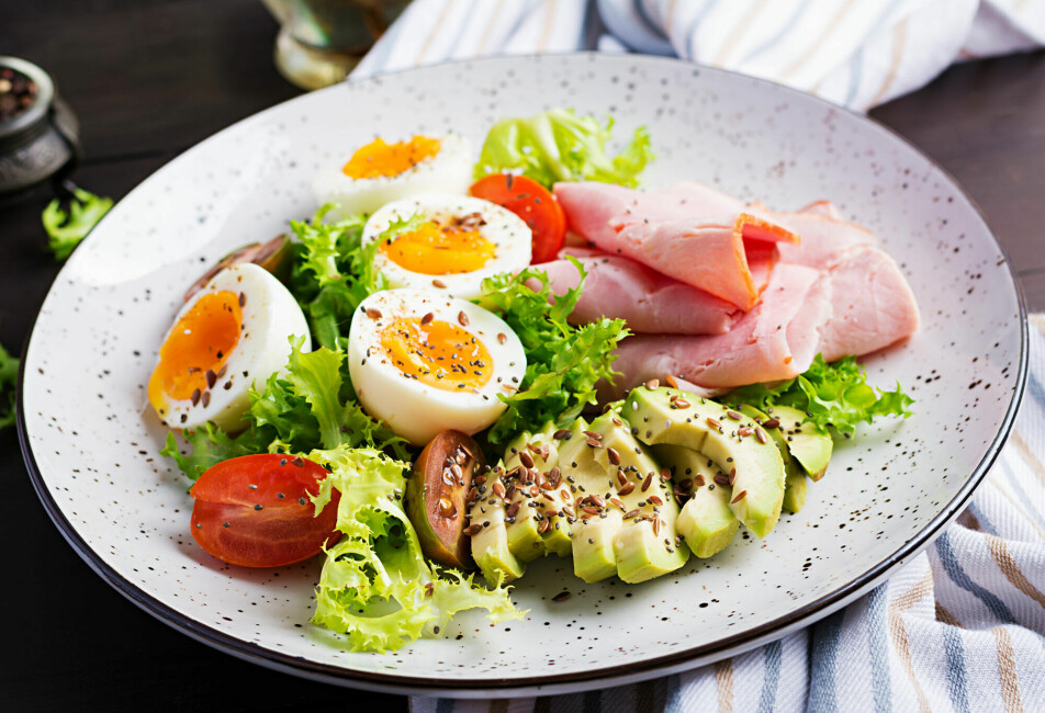 Ketogenic/paleo diet. Boiled eggs, ham, avocado and fresh salad.
