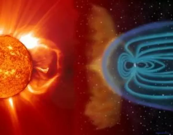 Illustrasjonen viser en sky av elektrisk ladede gasser som er slynget ut av sola og stanses av jordas magnetfelt.
