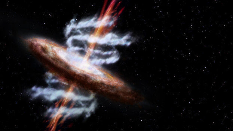 En aktiv galaksekjerne har et supermassivt svart hull som enorme mengder støv og gass, og til og med stjerner, spinner rundt. To gigantiske stråler av høyenergipartikler skyter ut av galaksekjernen. (Foto: ESA/AOES Medialab)