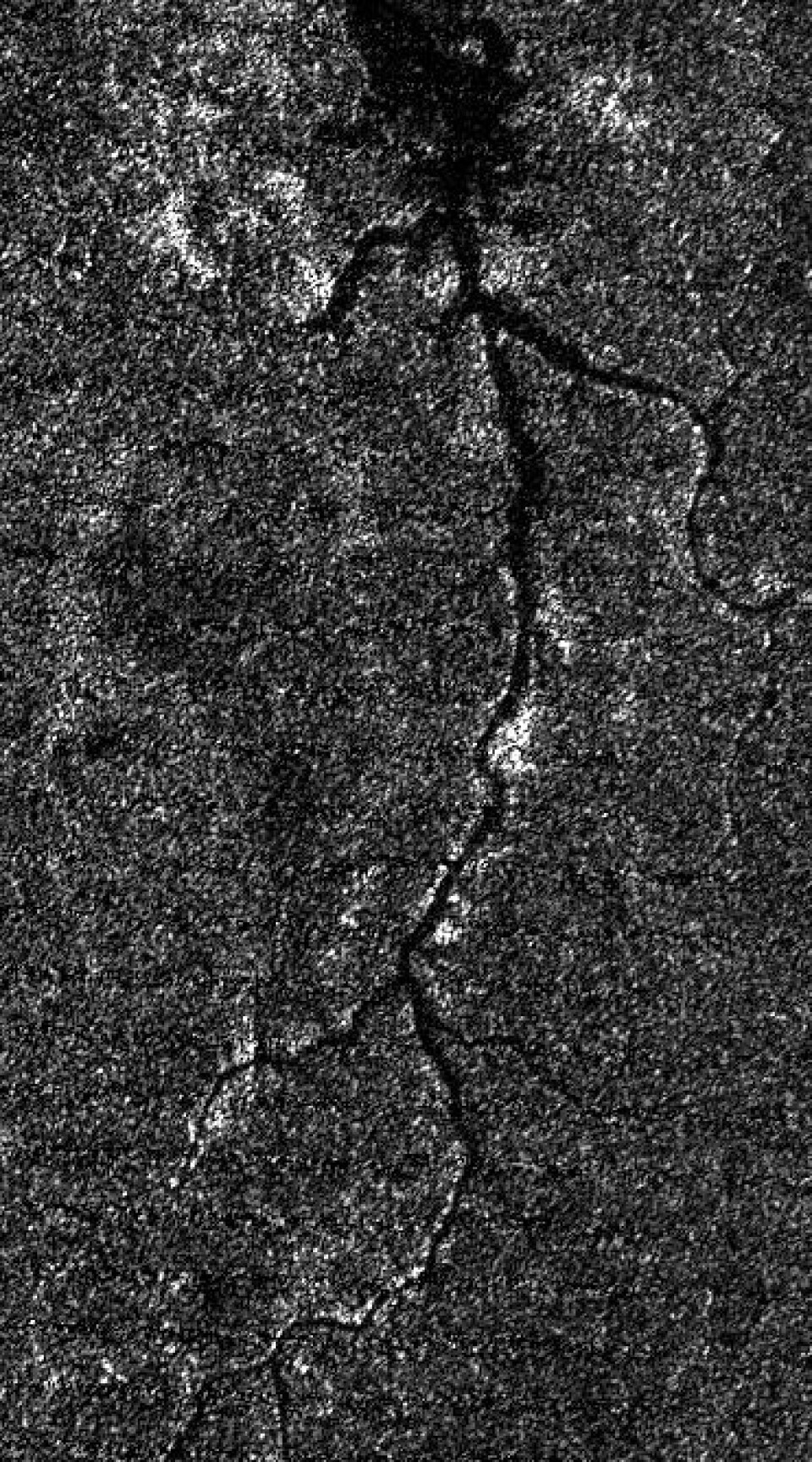 Landskap med elv på Titan. Her er romsonden Cassini brukt som radarsatellitt. Imponerende. Og tankevekkende. (Foto: NASA/JPL-Caltech/ASI)