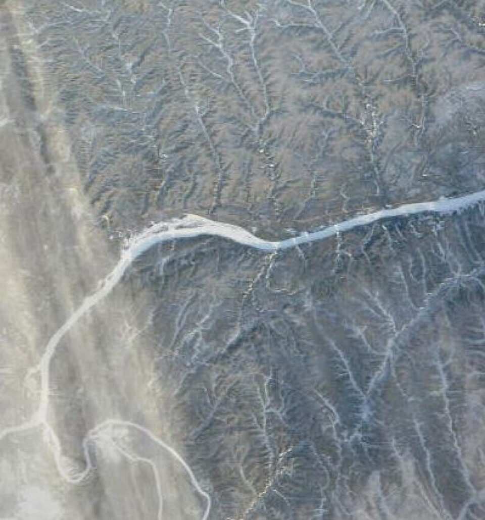 Her er den frosne sibirske elven Lena sett fra NASAs satellitt Terra 25. desember. Bildet er tatt nær byen Olekminsk. (Foto: (NASA Terra MODIS))