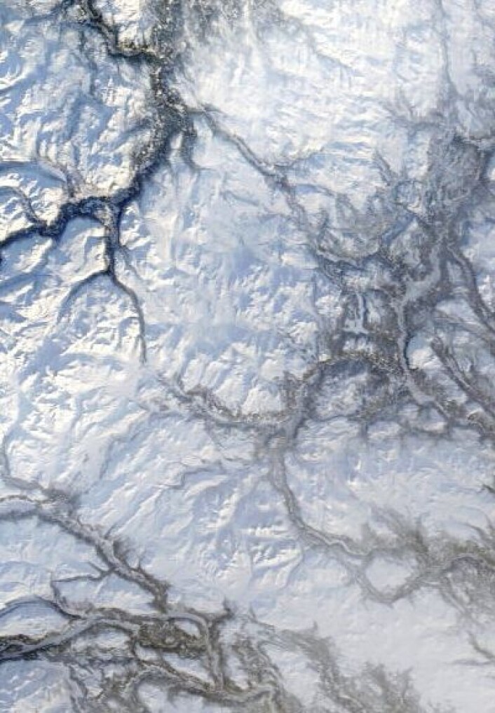 Det kan være kaldt ved Rondane når det er klar himmel i januar, ja. Her sett fra NASAs satellitt Terra 18. januar. (Foto: (NASA Terra MODIS)) Det kan være kaldt ved Rondane når det er klar himmel i januar, ja. Her sett fra NASAs satellitt Terra 18. januar. (Foto: (NASA Terra MODIS))