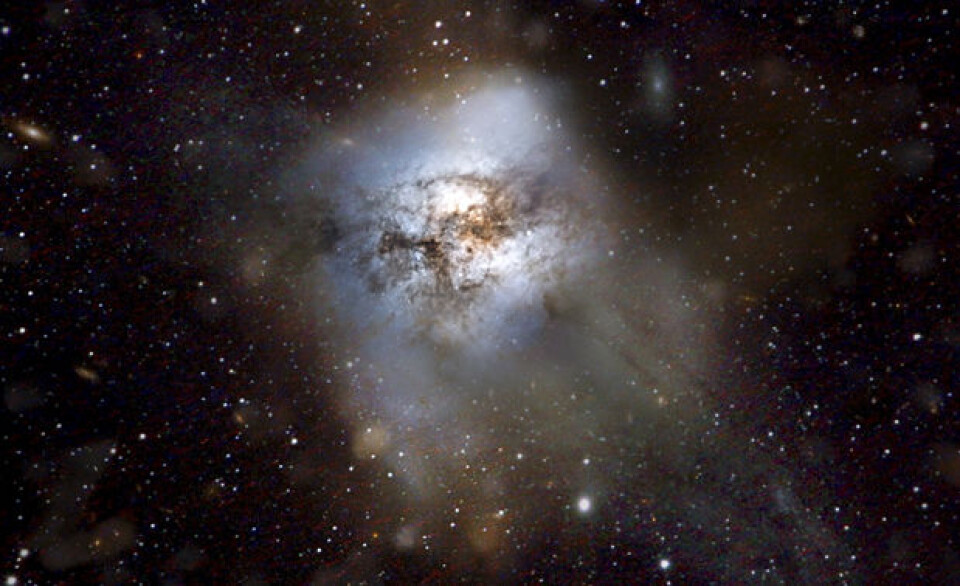Illustrasjon av galaksen HFSL3 som er hele 13 milliarer år gammel men danner likevel stjerner mye raskere enn Melkeveien. Galaksen ble oppdaget av romteleskopet Herschel. (Foto: ESA/C. Carreau)