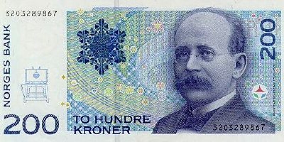 Birkeland var den forskeren som først forstod hvordan sola lager nordlyset. Han klarte sågar å demonstrere det på lab'en. Og så er han avbildet på 200-lappen. (Foto: (Norges Bank))