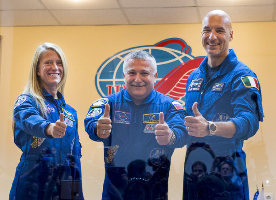 NASAs astronaut Karen Nyberg, kosmonaut Fjodor Jurtsjinkhin og ESAs astronaut Luca Parmitano før oppskyting til romstasjonen 28. mai 2013. (Foto: NASA/B. Ingalls)