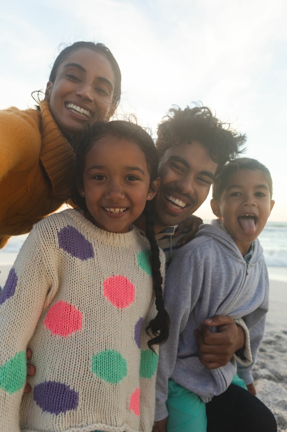Portrait,Of,Happy,Multiracial,Family,Taking,Selfie,During,Sunset,At