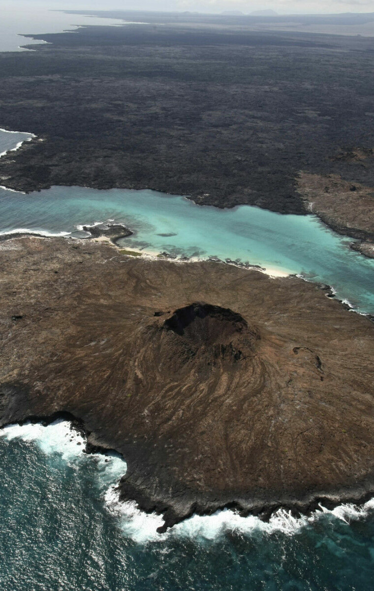 FILE - An aerial view of Sombrero Chino Island, Galapagos Islands, Ecuador, Jan. 15, 2011. Ecuador, Colombia, Costa Rica and Panama announced Tuesday, Nov. 2, 2021, that they will expand and join their marine reserves to create a vast corridor that will connect the Galapagos Islands in Ecuador with Colombia's Malpelo Island and the Cocos and Coiba Islands in Costa Rican and Panamanian waters in the Pacific Ocean in hopes of protecting sea turtles, tuna, squid, hammerhead sharks and other species. (AP Photo/Dolores Ochoa, File)