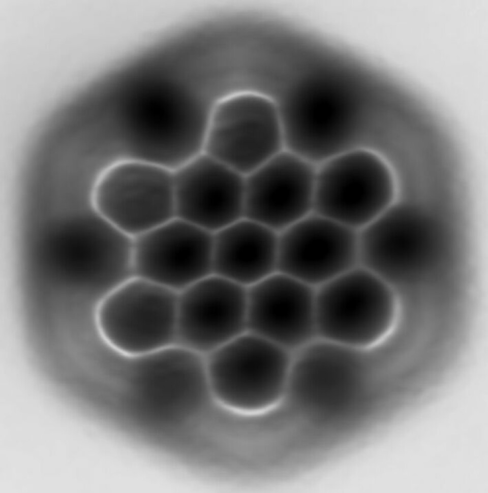 Et faktisk bilde av PAH-molekylet Hexabenzocorona. Kjemisk formel C42H18. Bildet er tatt med teknikken kalt atomært kraftmikroskop som tillater bilder av molekyler.