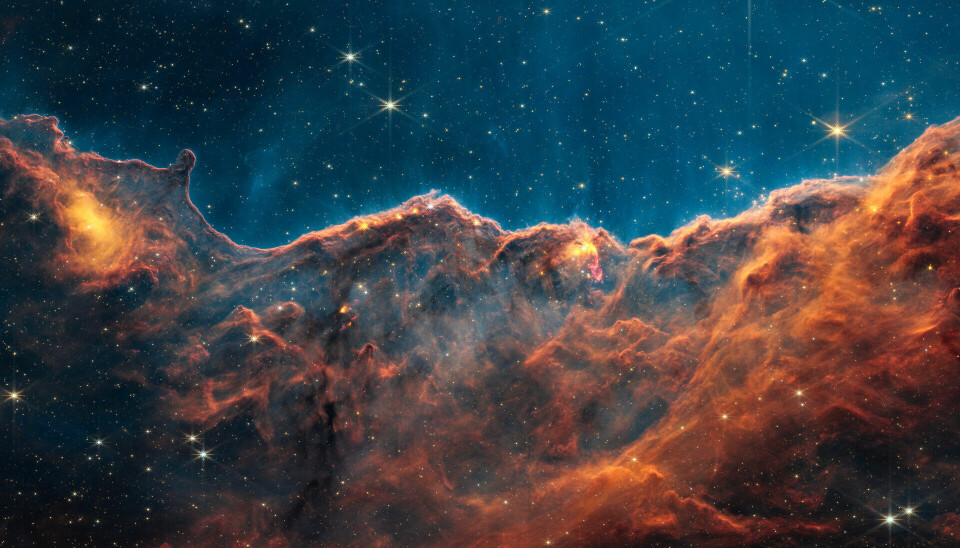 Dette bilde har James Webb tatt med et infrarødt kamera. Dette er et bilde av en stjernetåke.
