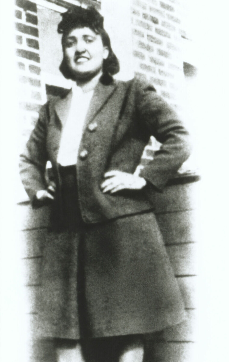Henrietta Lacks, after whom HeLa cells are named, standing outside her home in Baltimore, USA. HeLa cells are the first human cell line to be cultured for research into cancer. The source of the cells was an epidermoid carcinoma biopsy from the cervix of Henrietta Lacks aged 31. The tumour proved invulnerable to treatment and she died of cervical cancer 8 months later. At the time, scientists had no success growing cancer cells in the laboratory. HeLa cells, however, thrived. In the decades since 1952, HeLa cells have been used in research around the world. Photograph taken several years before Henrietta Lacks death. She died in 1951.