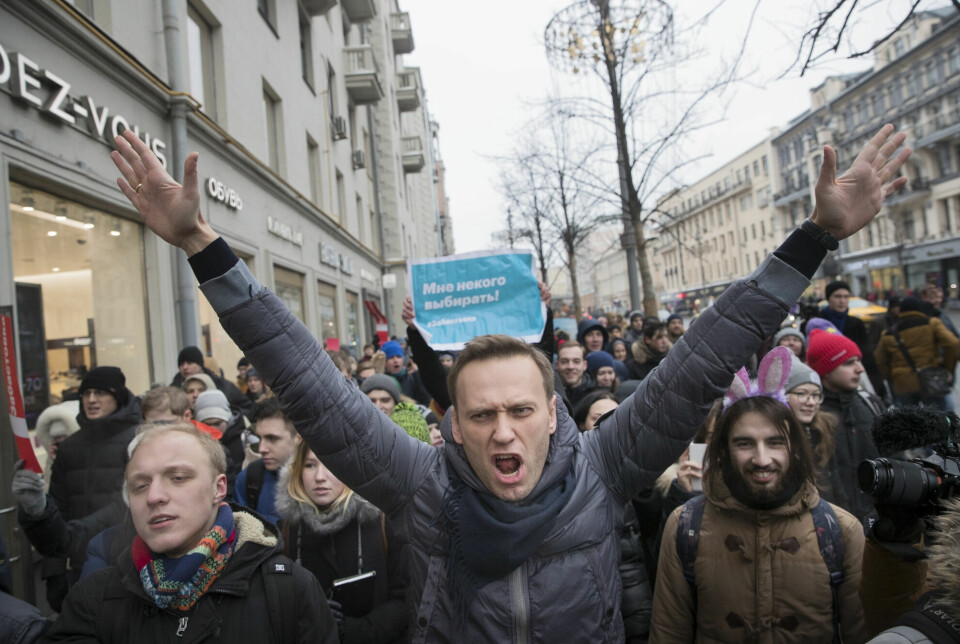 Her deltar den russiske opposisjonslederen Alexei Navalnyj i en demonstrasjon i Moskva i januar 2018. Han ble fengslet da han vendte tilbake til hjemlandet fra Tyskland der han ble behandlet for forgiftning i 2020. Han er dømt til ni års fengsel og soner i en straffekoloni i byen Vladimir.