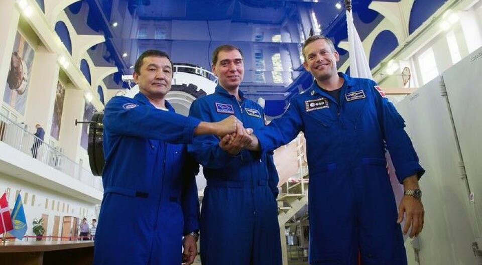 Andreas Mogensen (til høyre) med to kosmonauter som han ble skutt opp til romstasjonen sammen med, fra Bajkonur 2. september 2015.