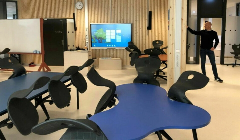 Learning space at Holen School in Bergen. Traditional desks have been replaced with larger tables where more students can fit.