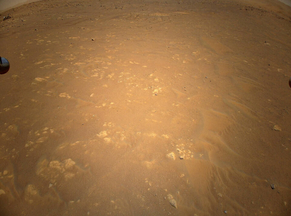 Mars-overflaten sett fra Ingenuity på flytur. Mars-overflaten sett fra Ingenuity på flytur.