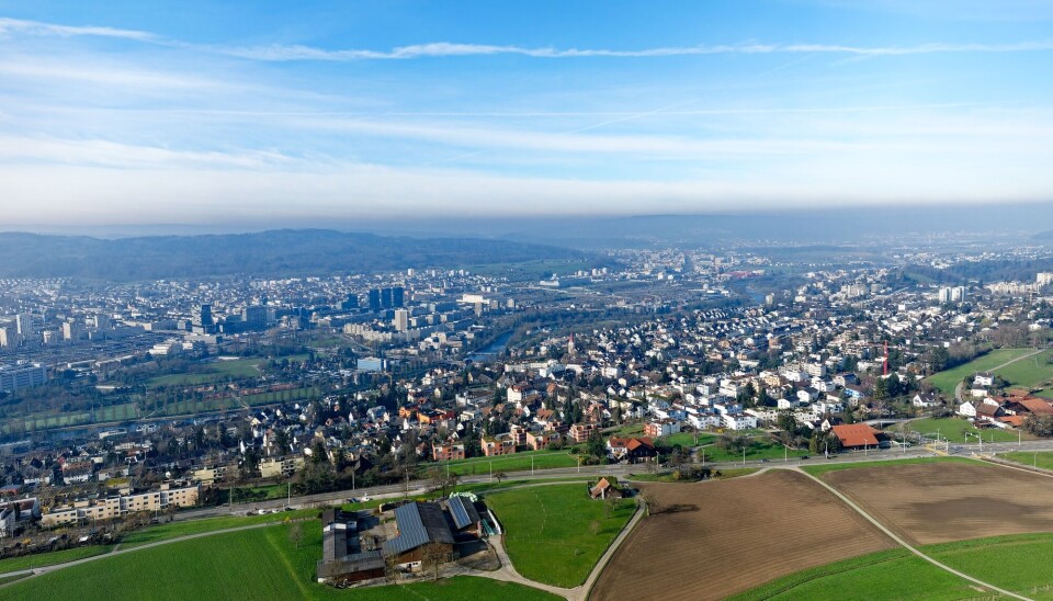 Et bredt belte av jorder eller skog rundt byen, kan være bra under hetebølger.